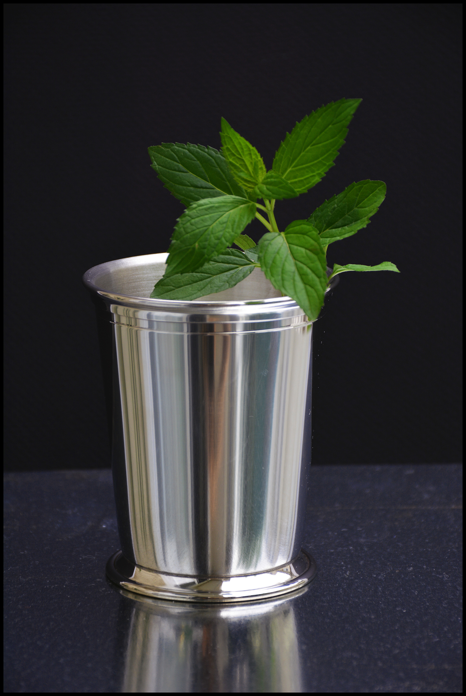 Pewter cup with herb